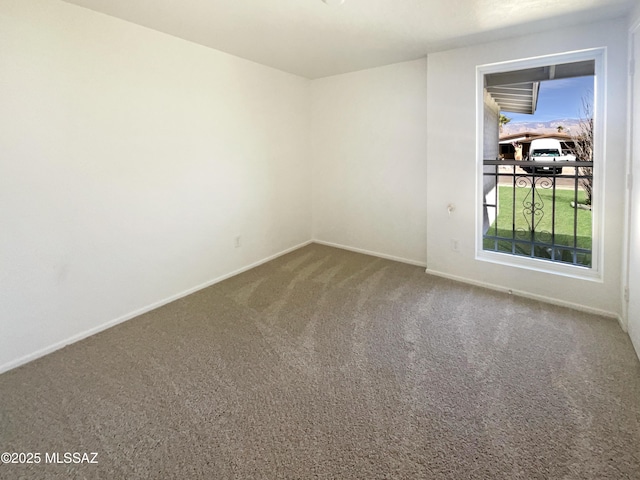 empty room with carpet flooring