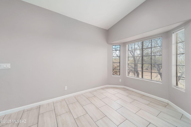 3098 S Giovanna Dr, Tucson, AZ 85730 - empty room with lofted ceiling and baseboards