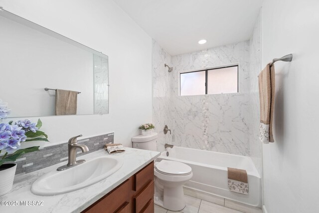 3098 S Giovanna Dr, Tucson, AZ 85730 - full bathroom featuring toilet, shower / bath combination, vanity, and backsplash