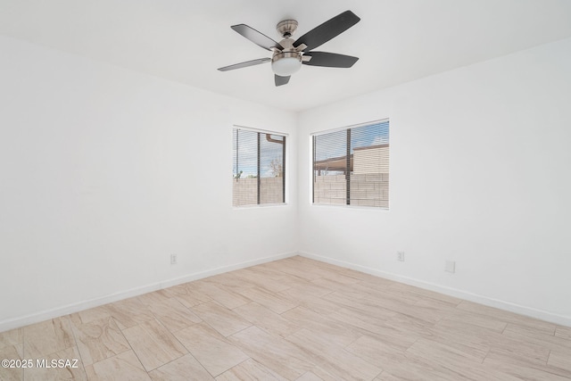 3098 S Giovanna Dr, Tucson, AZ 85730 - empty room with a ceiling fan and baseboards