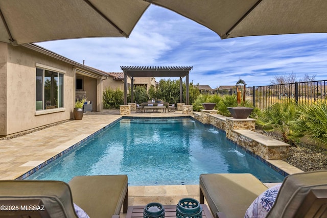 view of swimming pool with pool water feature, a pergola, and a patio