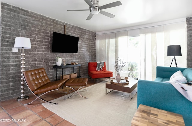 living room with ceiling fan, tile patterned flooring, and floor to ceiling windows