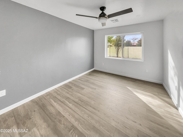 341 S Tucson Blvd, Tucson, AZ 85716 - unfurnished room featuring ceiling fan, baseboards, visible vents, and light wood-style flooring