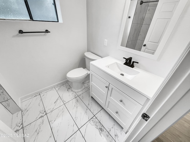 341 S Tucson Blvd, Tucson, AZ 85716 - bathroom with vanity, marble finish floor, a shower, baseboards, and toilet
