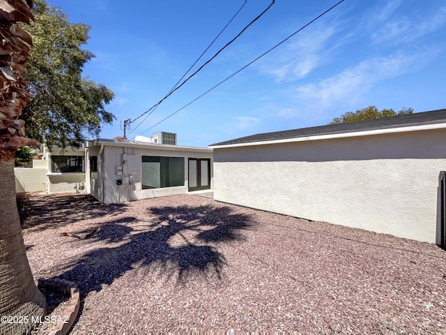 341 S Tucson Blvd, Tucson, AZ 85716 - rear view of house featuring stucco siding