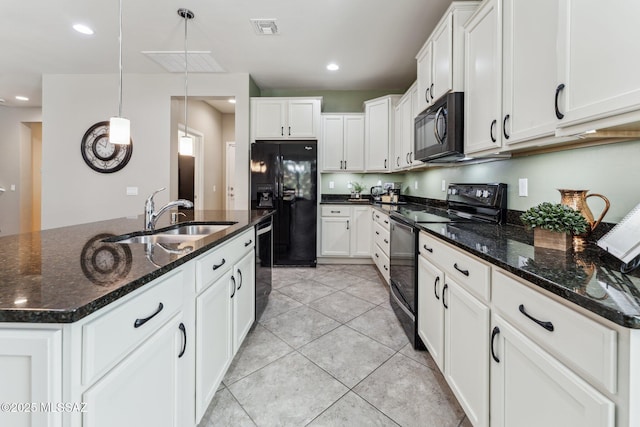 kitchen featuring light tile patterned floors, visible vents, a sink, black appliances, and pendant lighting