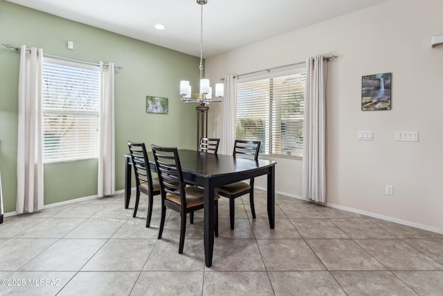 dining room featuring recessed lighting, baseboards, an inviting chandelier, and light tile patterned flooring