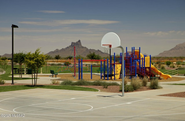 community jungle gym featuring community basketball court and a mountain view