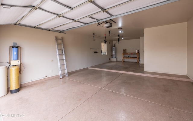 13289 E Wranglers Rest Dr, Vail, AZ 85641 - garage with water heater, a garage door opener, and baseboards
