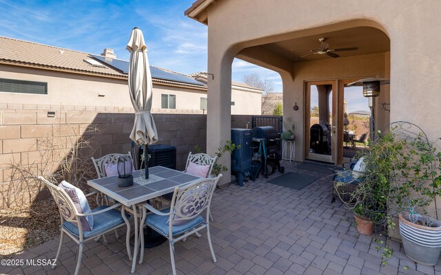 13289 E Wranglers Rest Dr, Vail, AZ 85641 - view of patio featuring ceiling fan, fence, grilling area, and outdoor dining area