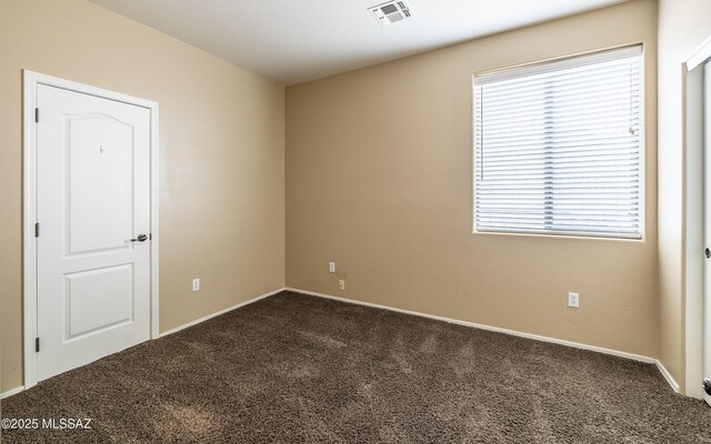 13289 E Wranglers Rest Dr, Vail, AZ 85641 - empty room featuring dark carpet and baseboards