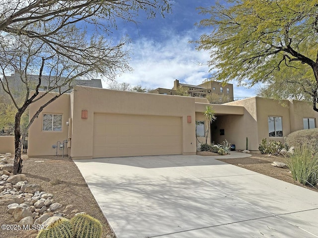 southwest-style home featuring a garage