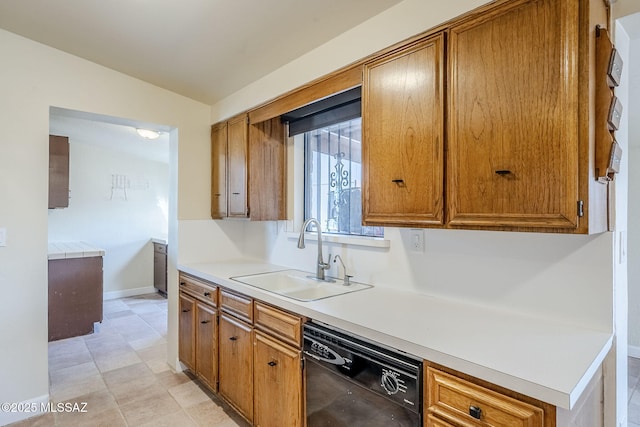 kitchen with dishwasher and sink