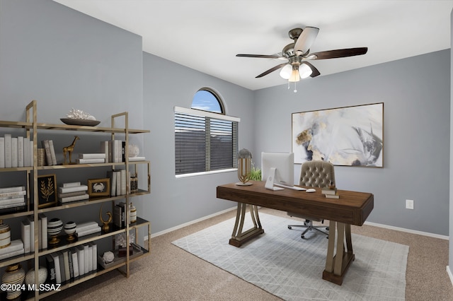 office space with ceiling fan and light colored carpet