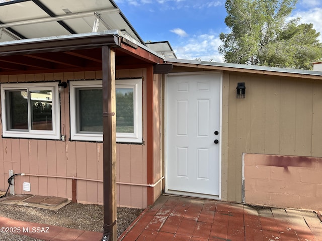 view of exterior entry featuring crawl space