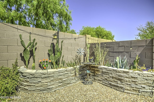 exterior space featuring a fenced backyard