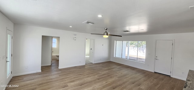 interior space featuring ceiling fan and light hardwood / wood-style floors