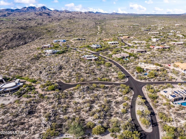 drone / aerial view featuring a mountain view