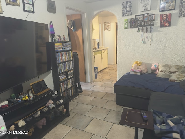 living room featuring light tile patterned floors