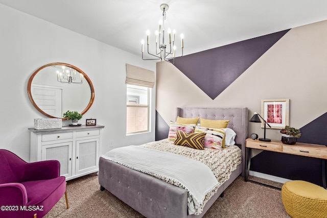 bedroom with dark colored carpet and an inviting chandelier