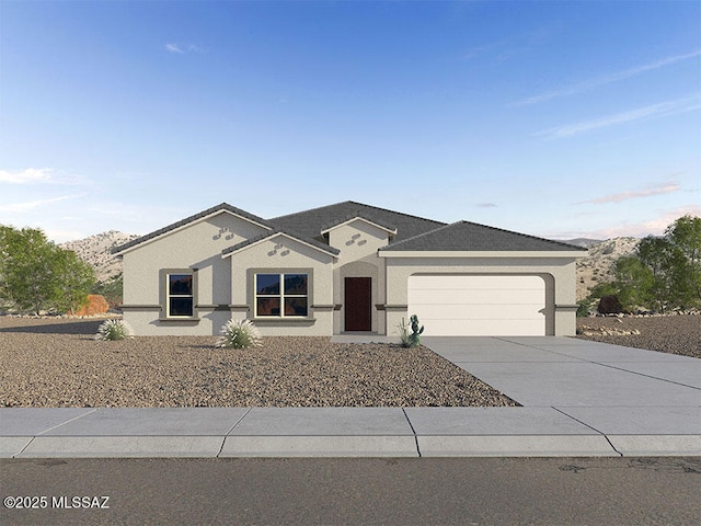 ranch-style house with concrete driveway, a mountain view, an attached garage, and stucco siding