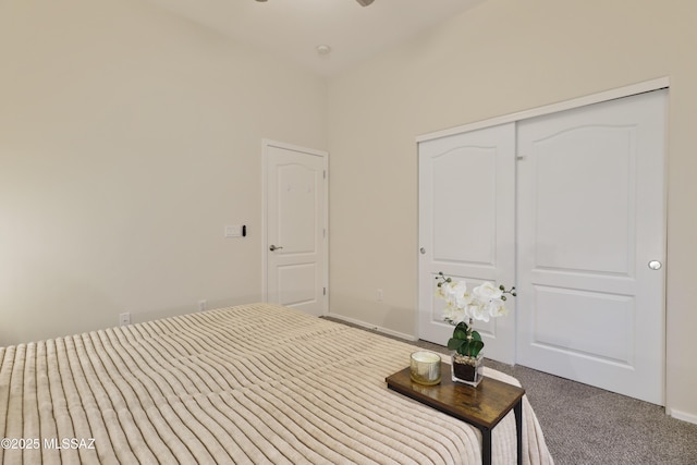 bedroom with carpet floors and a closet