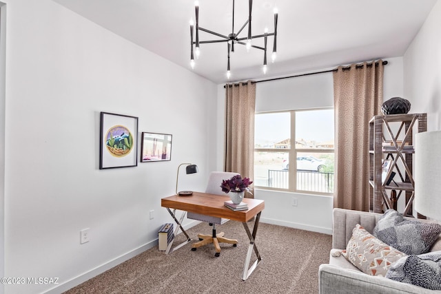 office featuring an inviting chandelier, carpet floors, and baseboards
