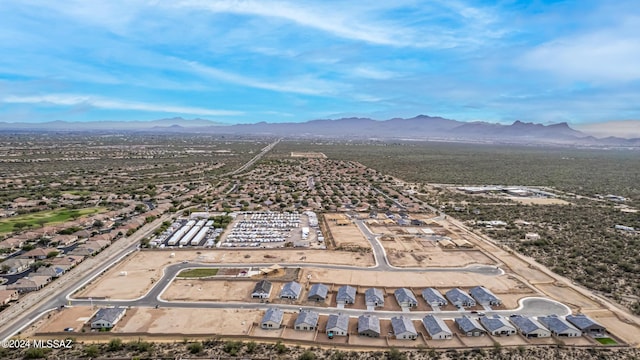 birds eye view of property featuring a mountain view