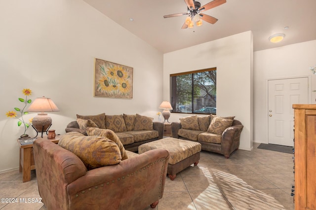 living room featuring light tile patterned floors, high vaulted ceiling, and ceiling fan