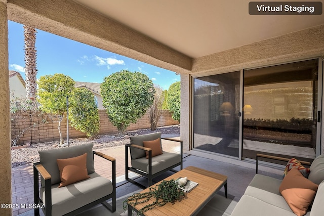 view of patio / terrace with a fenced backyard and outdoor lounge area