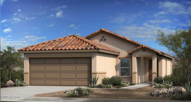 mediterranean / spanish house featuring a garage