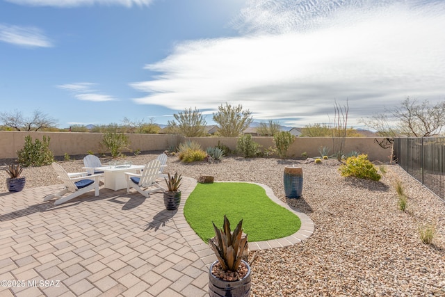 view of patio featuring a fenced backyard