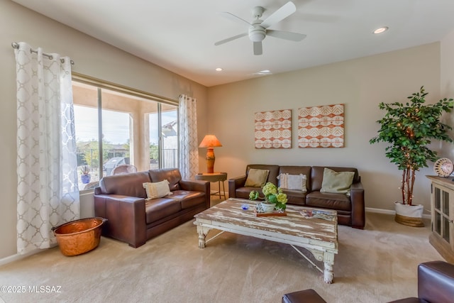 living area featuring baseboards, a ceiling fan, carpet flooring, and recessed lighting