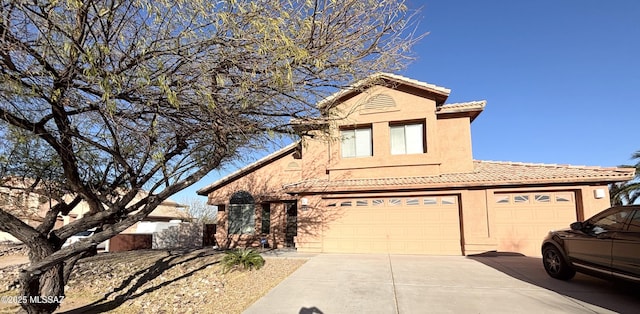 view of front of house with a garage