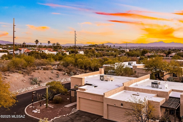 birds eye view of property featuring a mountain view