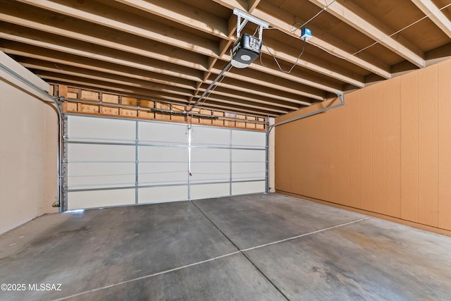 garage featuring a garage door opener