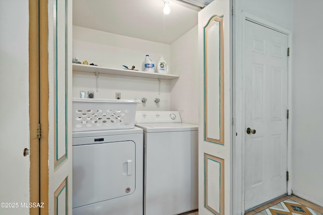 laundry area with washing machine and dryer and laundry area