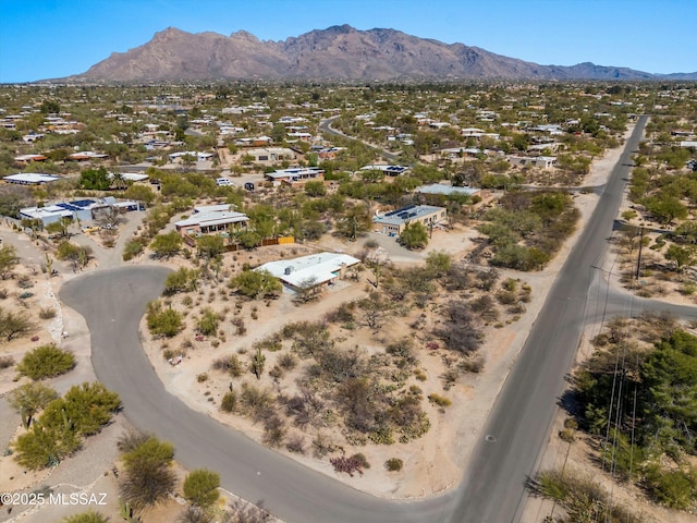 drone / aerial view featuring a mountain view