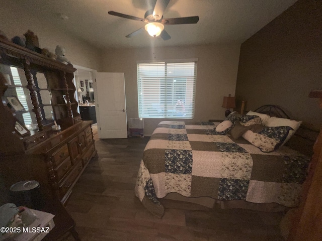 bedroom featuring dark hardwood / wood-style floors and ceiling fan