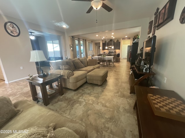 living room with ceiling fan