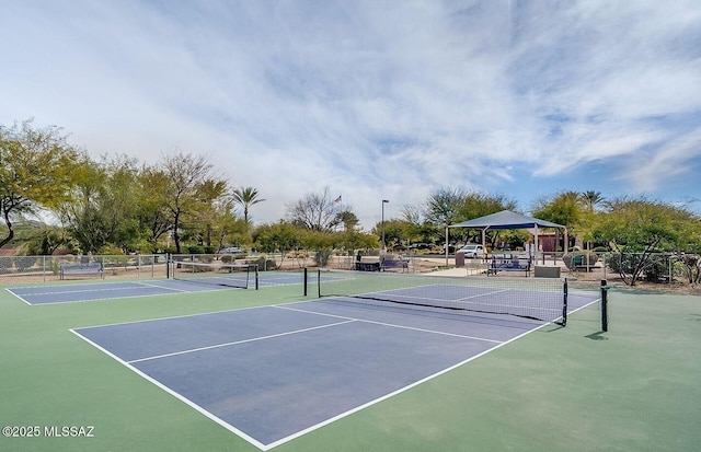 view of tennis court with a gazebo