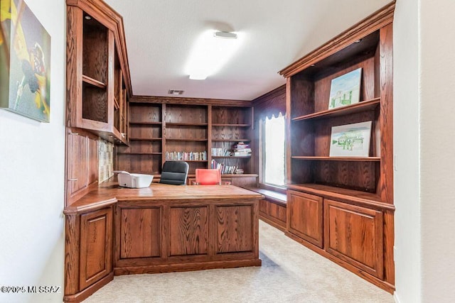 unfurnished office with light colored carpet and visible vents