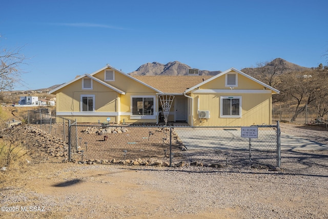 view of front of home with a mountain view