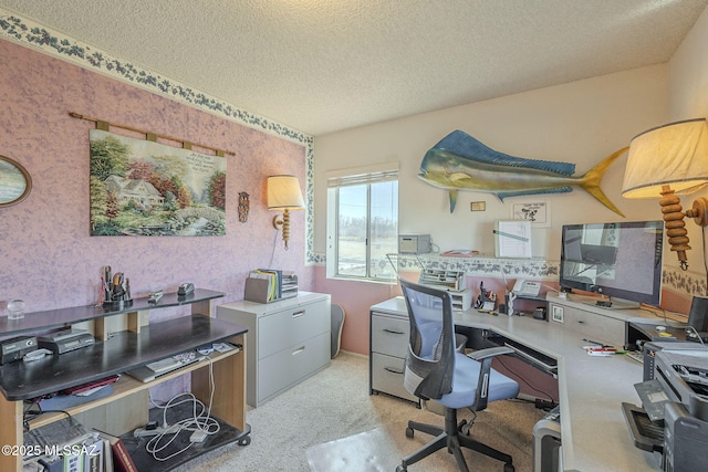 office area with a textured ceiling