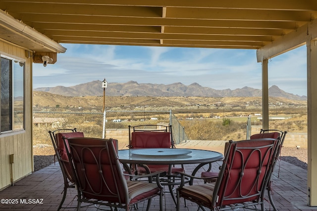 view of patio / terrace featuring a mountain view