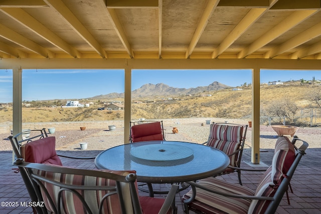 view of patio / terrace with a mountain view