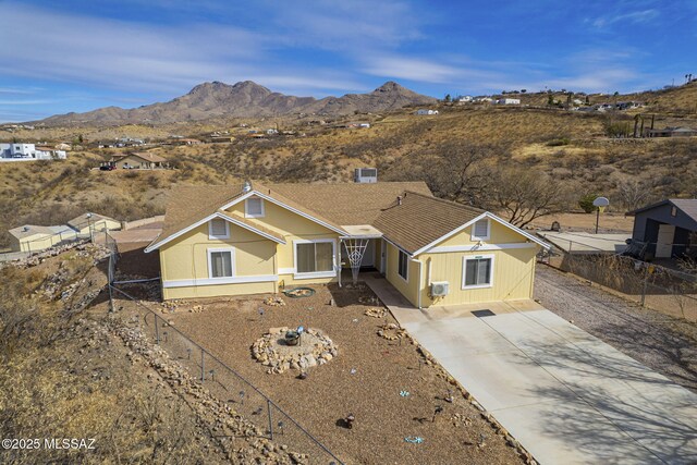 view of front of property with a mountain view