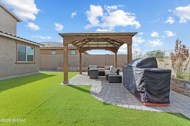 view of yard featuring a patio, outdoor lounge area, a fenced backyard, and a gazebo