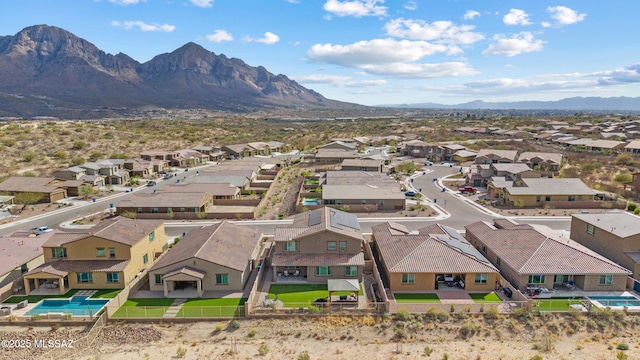 bird's eye view with a mountain view and a residential view