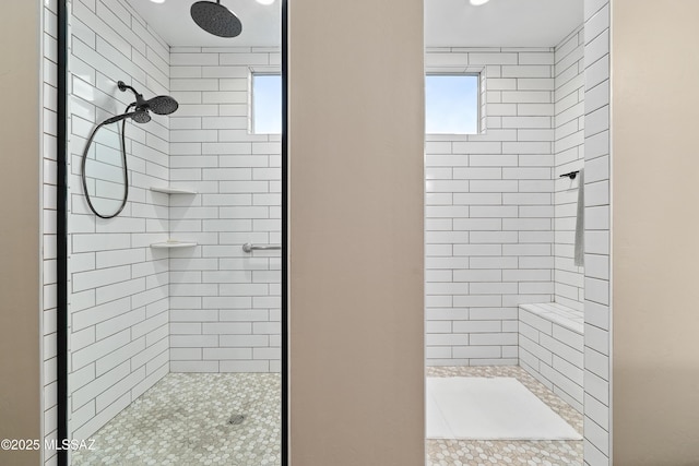 full bathroom featuring a tile shower